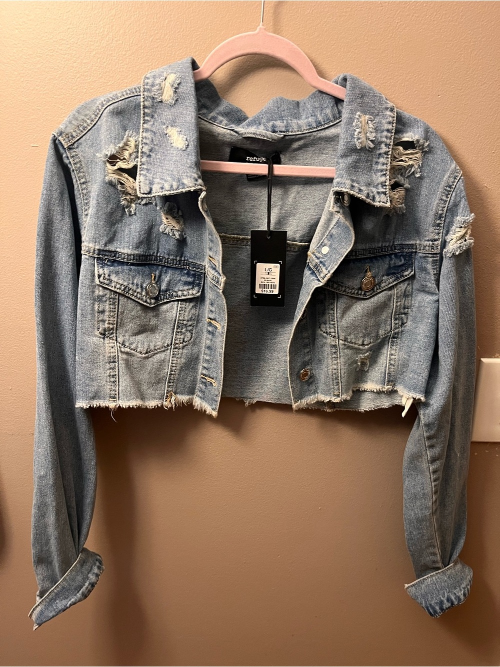 Light Blue Distressed Cropped Denim Jacket- woman’s